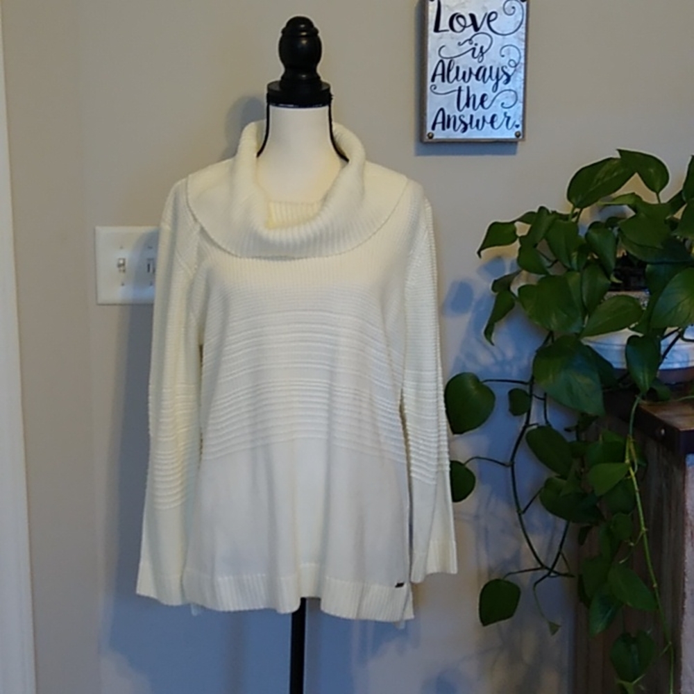 Calvin Klein cream colored turtleneck sweater